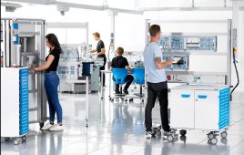 Students in a modular training lab at Festo