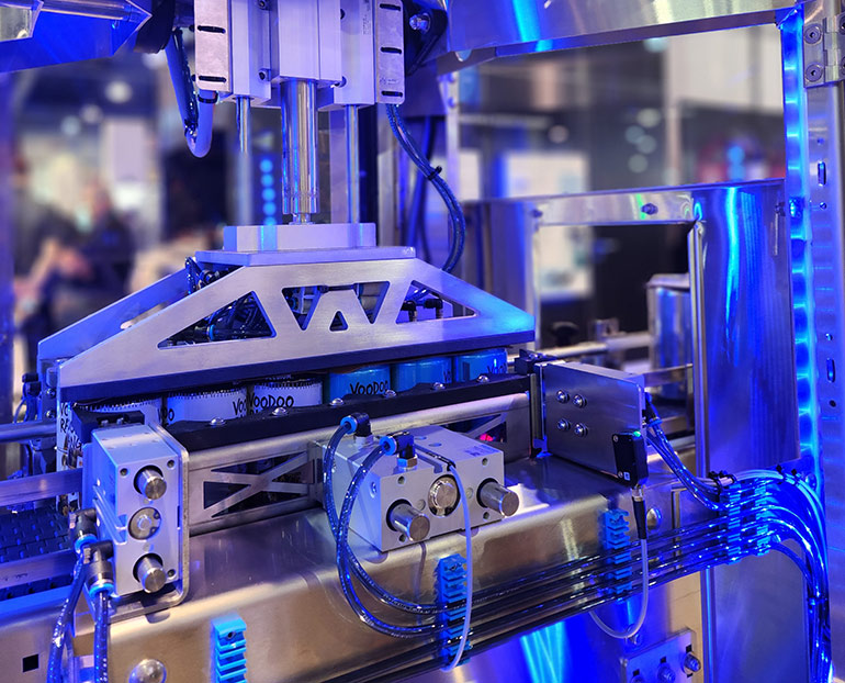 Festo displays a new canning machine it helped develop with its electric actuation technologies and pneumatic gripping at Pack Expo 2023 in Las Vegas.