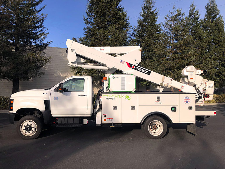 The Terex Hypower Smart PTO by Viatec is an electric power take-off that powers all hydraulic functions of a utility truck, plus in-cab air-conditioning, while the truck engine is off. Image courtesy of TEREX