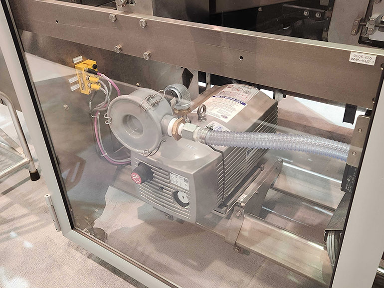 A local vacuum pump provides compressed air to this Delta robot gripper system, reducing leaks and increasing efficiency.