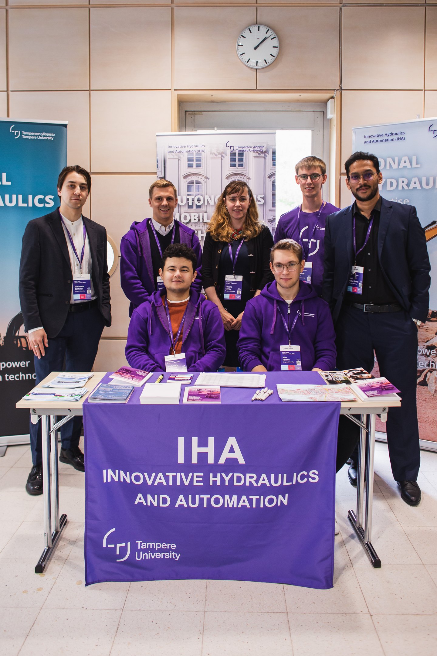 Team members of the Innovative Hydraulics and Automation (IHA) at the SICFP 2023 expo.